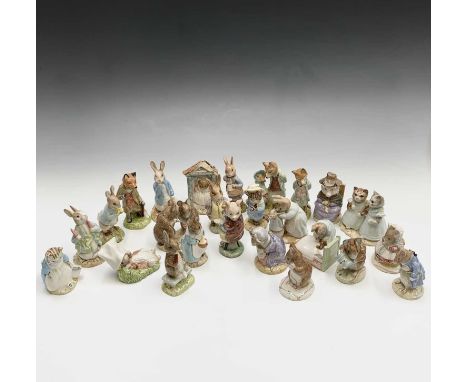 A collection of twenty-two Royal Albert Beatrix Potter figures to include 'The Old Woman who lived in a Shoe Knitting', 'Tom 