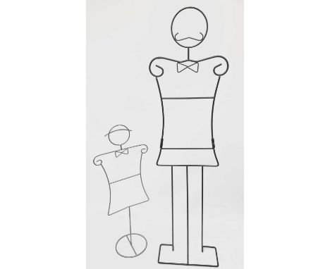 A French wrought iron mannequin, of stylised form, height 163cm, together with a similar smaller mannequin (2).