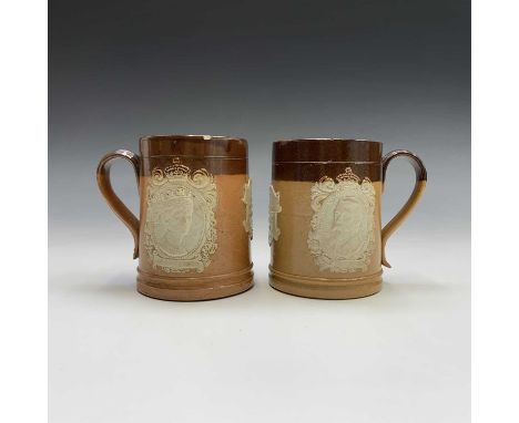A pair of early 20th century Royal Doulton salt glaze stoneware mugs commemorating the coronation of King George V and Queen 