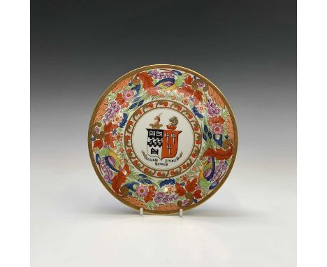 A Barr, Flight and Barr Worcester armorial plate, the ornate polychrome and gilt border with exotic birds, flowers and foliag