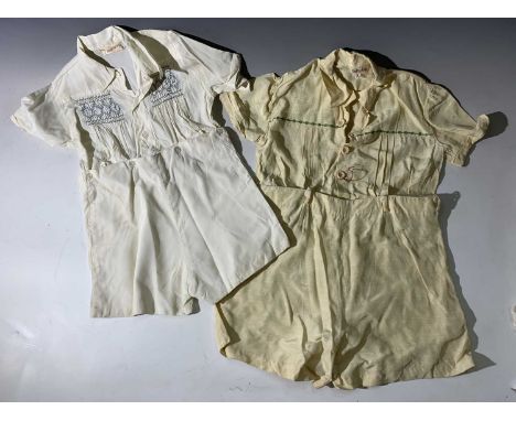 Three children's 1930s/40s romper suits, a child's silk blouse, bibs and other items.