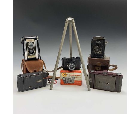 A Voigtlander Brilliant camera and case, height 12cm, together with four other cameras and a tripod.