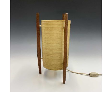 A 1970s teak "Rocket" lamp, with cylindrical fibreglass shade, on three feet. Height 35.5cm.  Condition report: There are no 
