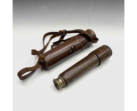 A military three draw brass telescope, stamped TEL.SCT.RECT. Mk II BC Ltd &amp; Co, 15298 and broad arrow mark, stitched leat