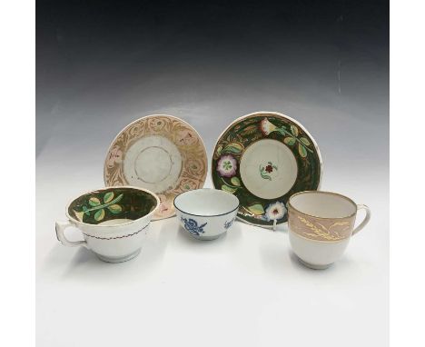 A Caughley blue and white tea bowl, printed with fruit, together with a Derby cup and saucer and one other.