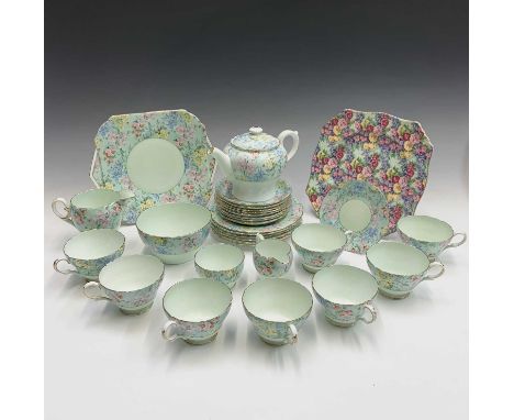 A Shelley 'Melody' pattern tea set comprising teapot, milk jug, sugar basin, a smaller jug and sugar basin, a cake/sandwich p