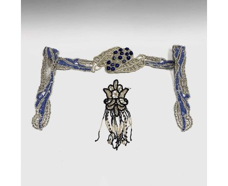 An early 20th century heavily beaded belt in shades of silver and blue, length 100cm, together with a black and gold beaded c