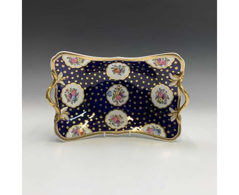 A Spode porcelain twin-handled rectangular basket, circa 1820, the blue ground decorated with gilded dots and painted floral 