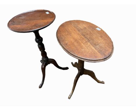 A George III mahogany tripod table, height 72.5cm, diameter 38cm and an oak tripod table.