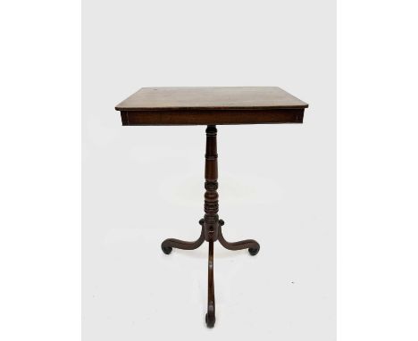 A George IV mahogany tripod table, the rectangular top with two opposing frieze drawers, on a turned stem, height 76.5cm, wid