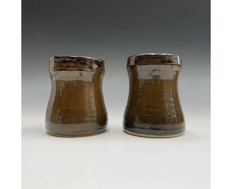 Lowerdown pottery, A Jeremy Leach pot, of slightly waisted form, brown glazed, height 12cm, and another similar (2).
