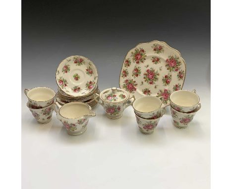 A James Kent 'La Rosa' pattern tea service, six place settings comprising six teacups, six saucers, six side plates, a milk j