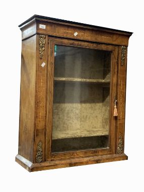 A Victorian inlaid walnut side cabinet, with a single glazed door flanked by gilt metal mounts, on a plinth base, height 91.5