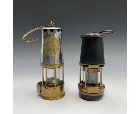 A 'The Protector Lamp and Lighting Co Ltd Eccles' Type 6 miner's lamp, height 25cm, together with a Wolf Type FS safety lamp 