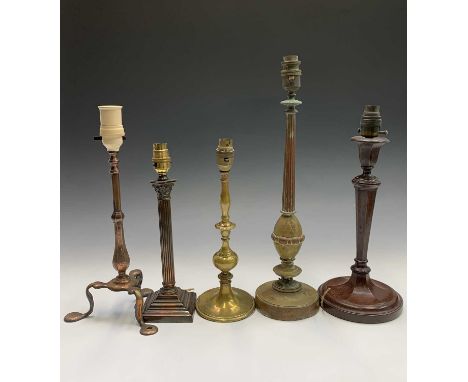 A 1930s mahogany table lamp, modelled as a Georgian candlestick, height 38cm, together with a copper Arts and Crafts style la