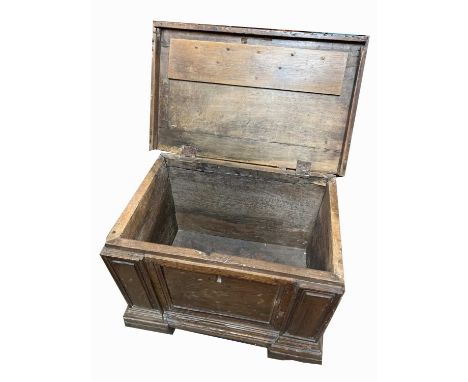 A Continental walnut small chest, 18th century, with lift up lid and panelled front on bracket feet, height 41cm, width 55cm,
