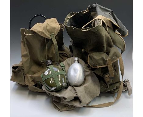 A Bukta canvas backpack, another army backpack, two water bottles and a kit bag (5).