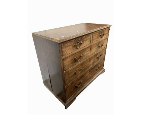 A George III mahogany chest of drawers, of small proportions, with two short and three long drawers, on bracket feet, height 