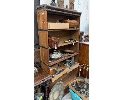 Three Globe Wernicke sectional bookcases, all lacking the glazed doors, largest measures 175cm, width 86.5cm, depth 26cm, sma