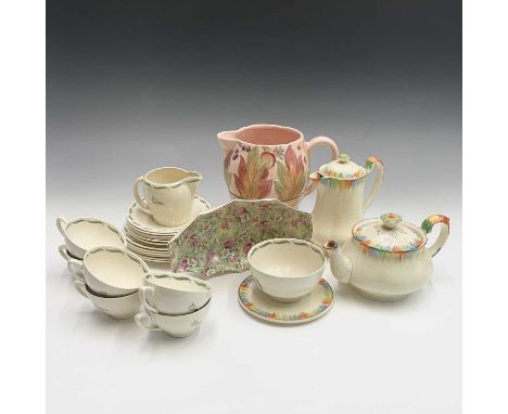 A Susie Cooper 'Tiger Lily' pattern tea set, six place settings comprising six cups (one undecorated), six saucers, six side 