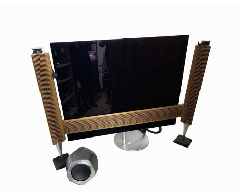 A Bang & Olufsen Beo Vision Eclipse 65" television, with a pair of matching freestanding speakers, height 134cm, together wit