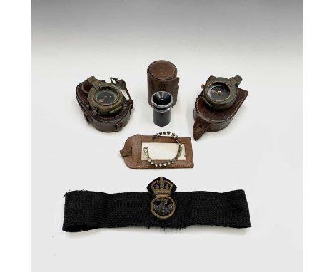 A World war I marching compass, the leather case stamped "Martins Birm Limd 1916", together with a further Verners marching c