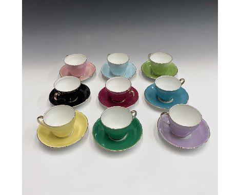 An Adderley harlequin tea set comprising nine teacups and saucers.