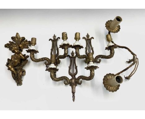 A trio of gilt brass twin sconce wall lights, height 24cm, together with one other gilded metal twin sconce wall light with c
