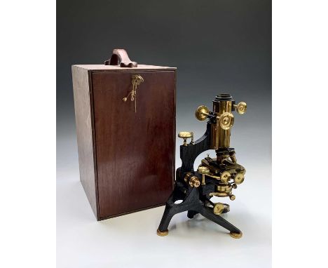 A microscope, by W Watson &amp; Sons, High Holborn, London with brass and black lacquered finish, cased, overall height of ca