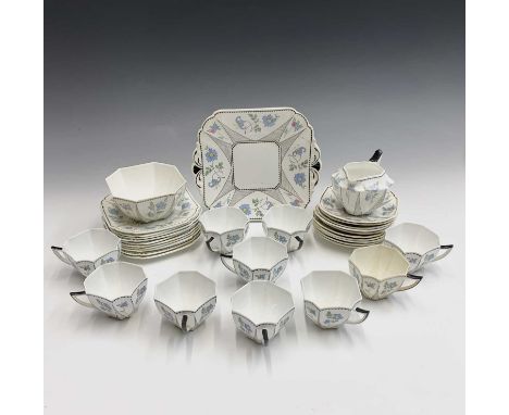 A 1920s/30s Shelley 'Queen Anne Cornflower' pattern tea service comprising ten teacups, ten saucers, ten side plates, one cak