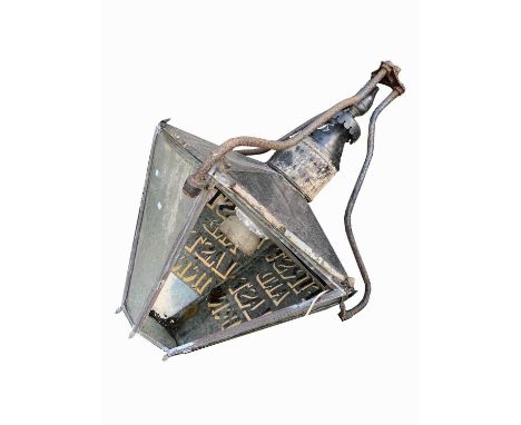 A large exterior lantern, with painted copper hood and tapered glass sides inscribed 'First And Last Inn', formerly positione