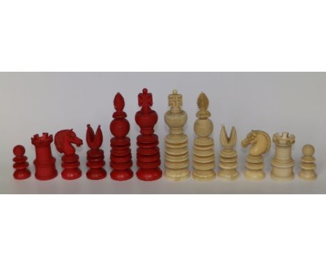 A late 19thC turned ivory chess set, the kings 3.6” high.  SEE ILLUSTRATION