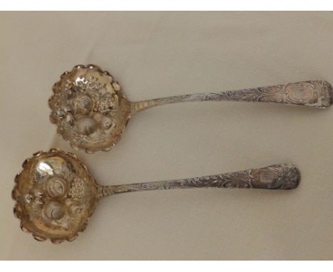 A George III silver sifter and matching ladle with later embossed decoration – London marks. (2)