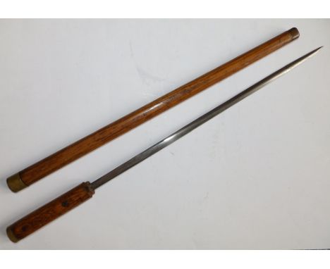 An early 20thC short sword stick in wooden sheath with brass mounts,  22” overall.