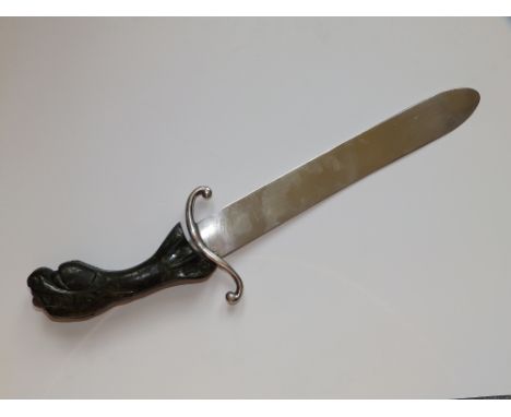 A Maltese silver bladed page turner with bold jade coloured handle modelled as a dragon's head, 15.5” overall.