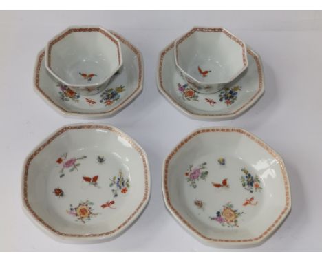 A pair of early 19thC Oriental porcelain octagonal tea bowls together with four saucers painted in the European taste with sc