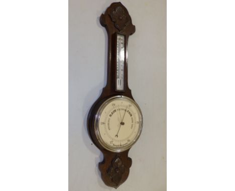 An oak wall barometer.