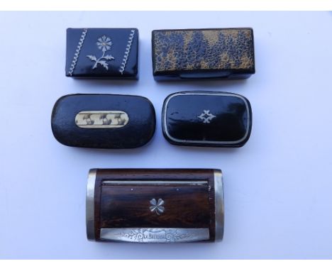 A metal mounted snuff box – 'La Bretonne' and six others. (7)