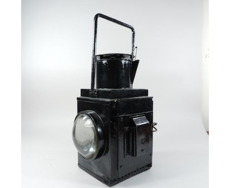 An early 20th century black painted railway lamp, marked BR (W), 45cm high