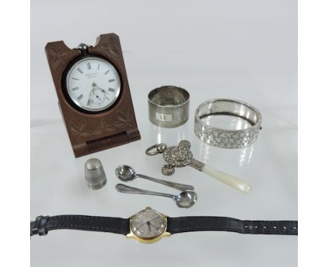 A Victorian silver cased pocket watch, by H.W. Benson, together with a silver baby's rattle, napkin ring, bangle, a ladies wr