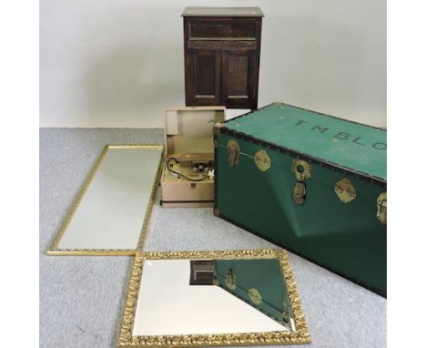 A vintage travelling trunk, 100cm, together with an oak side cabinet, two gilt framed wall mirrors and a Kodak projector