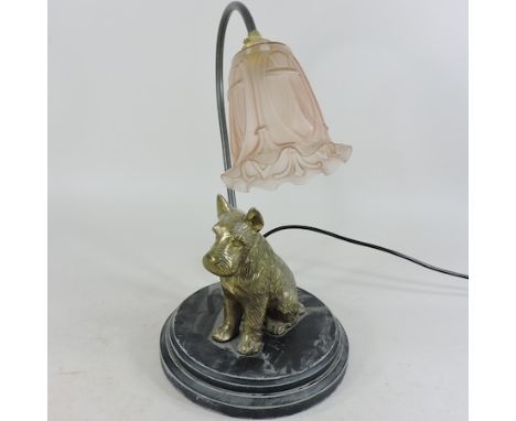 A table lamp, in the form of a dog, with a pink glass shade, 40cm tall