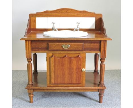 A modern mahogany washstand and basin, 97cm