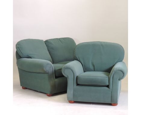 A green upholstered two seater sofa, 147cm, together with another and a matching armchair (3)