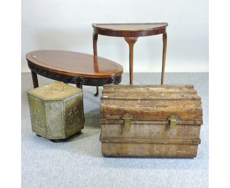 A Chinese style oval coffee table, 114 x 54cm, together with a half round side table, a metal trunk, toys, brass door knobs a