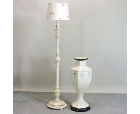 A white painted standard lamp, 180cm high