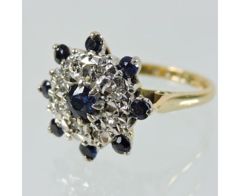 An 18 carat gold sapphire and diamond dress ring