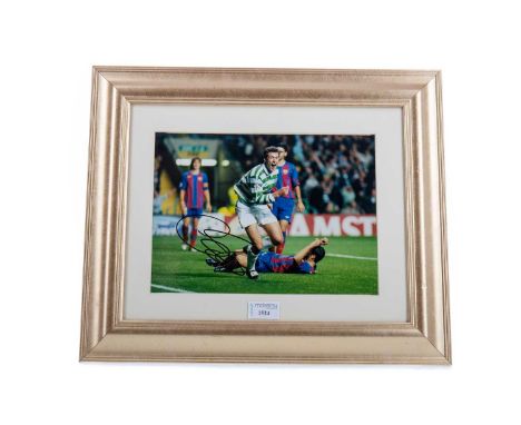 CELTIC FOOTBALL CLUB INTEREST - SIGNED PHOTO OF CHRIS SUTTON,scoring against FC Barcelona in the UEFA Champions League, frame