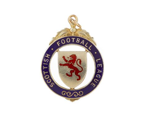 SCOTTISH FOOTBALL LEAGUE CUP GOLD MEDAL 1960-61,awarded to Jim Baxter of Rangers F.C., the obverse with central shield shaped