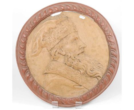 A terracotta plaque, relief decorated with a portrait, 44cm